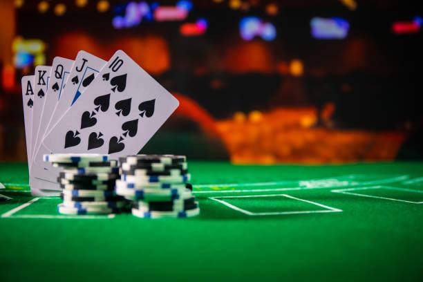 Mobile phone screen showing Auto Roulette settings panel with spin count, stake, and betting zone options